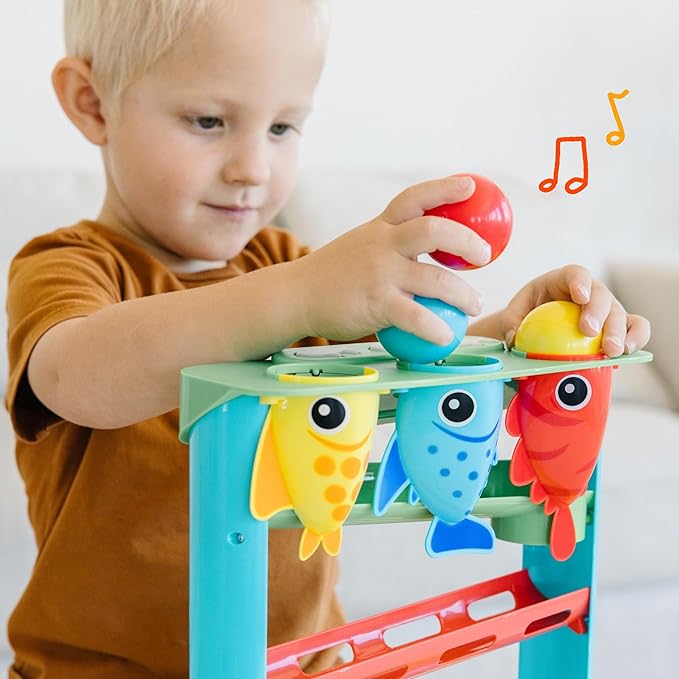 Move2Play, Feed The Fish | 30+ Fin-Tastic Songs & Phrases | Baby & Toddler Musical Toy | First Birthday Present for 1+ Year Old | Ages 6-24 Months | Boy & Girl Ball Drop Toy