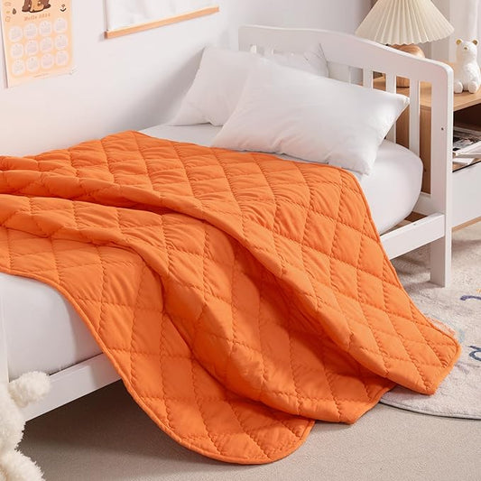 NTBAY Down Alternative Toddler Comforter, Lightweight and Warm Solid Color Baby Crib Quilted Blanket, 39x47 inches, Orange