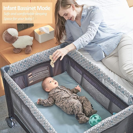 5 in 1 Multifunctional Pack and Play,Qutanix Foldable Baby Crib with Bassinets,Changing Table,Newborn Napper with Canopy,Diaper Stacker,Baby Playpen for Babies and Toddlers