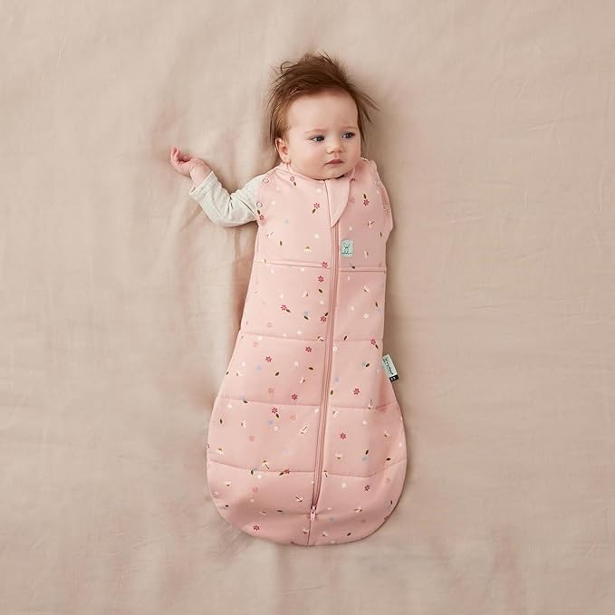 ergoPouch Cocoon Swaddle Sack 1.0 TOG - Baby Sleep Sack, Gentle Snug Fit Helps Calm Startle Reflex, Ideal for Arms In/Out Sleeping, Soft Breathable Fabric for Better Sleep (6-12 Months, Daisies)