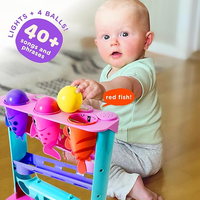 Move2Play, Feed The Fish | 30+ Fin-Tastic Songs & Phrases | Baby & Toddler Musical Toy | First Birthday Present for 1+ Year Old | Ages 6-24 Months | Boy & Girl Ball Drop Toy