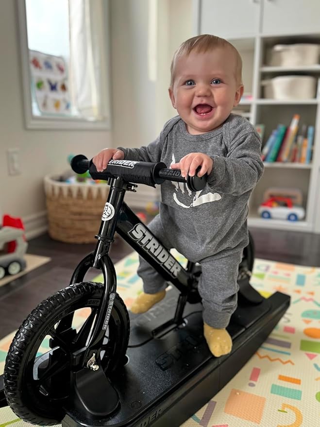 Strider 12” Pro Bike - Helps Teach Baby How to Ride a Balance Bicycle - for Kids 6 Months to 4 Years - Easy Assembly & Adjustments