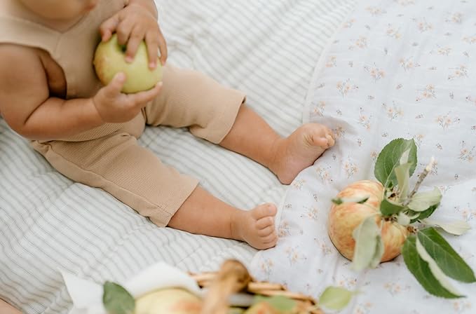 Oilo 100% Organic Premium Cotton Muslin Crib Quilt (45" x 60") Print and Solid Sides, Extra-Soft & Lightweight, Fits Toddler Beds, Heirloom Organic Collection, Cream & Peach Flowers, Dainty Floral