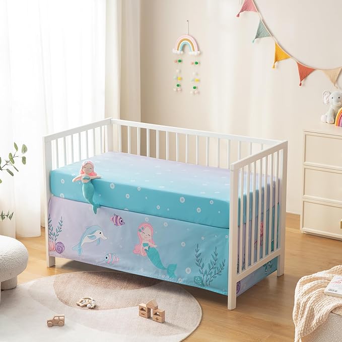 4 Pieces Crib Bedding Set for Baby Boys Girls, Infant Toddler Nursery Baby Bedding Sets Includes Cartoon Quilt, Fitted Crib Sheet, Crib Skirt and Plush Mermaid Toy