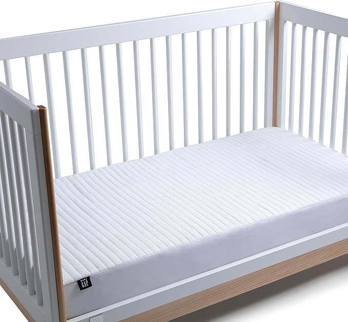Crib Mattress Protector for Infants and Toddlers - Waterproof, Cooling, Soft Quilted, Elastic, and Washable Baby Mattress Protector in White, Quiet Comfort by babyGap