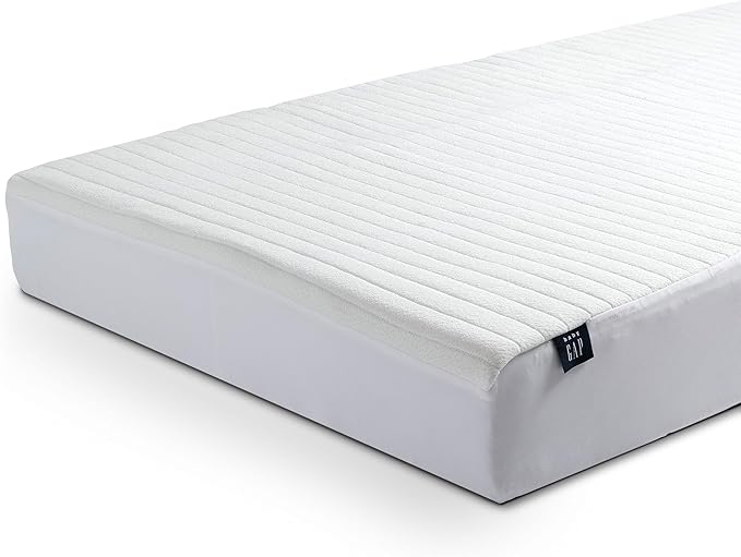 Crib Mattress Protector for Infants and Toddlers - Waterproof, Cooling, Soft Quilted, Elastic, and Washable Baby Mattress Protector in White, Quiet Comfort by babyGap