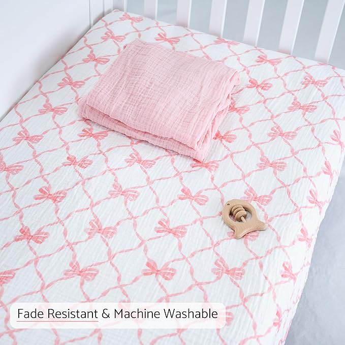 LollyBanks Muslin Crib Sheet 1 Pack, Soft and Breathable 100% Cotton Crib Fitted Sheets for Girls, Cozy and Snug Baby Sheet for Standard 52"x28" Mattress, Baby Bedding Essentials (Pink Bow Print)